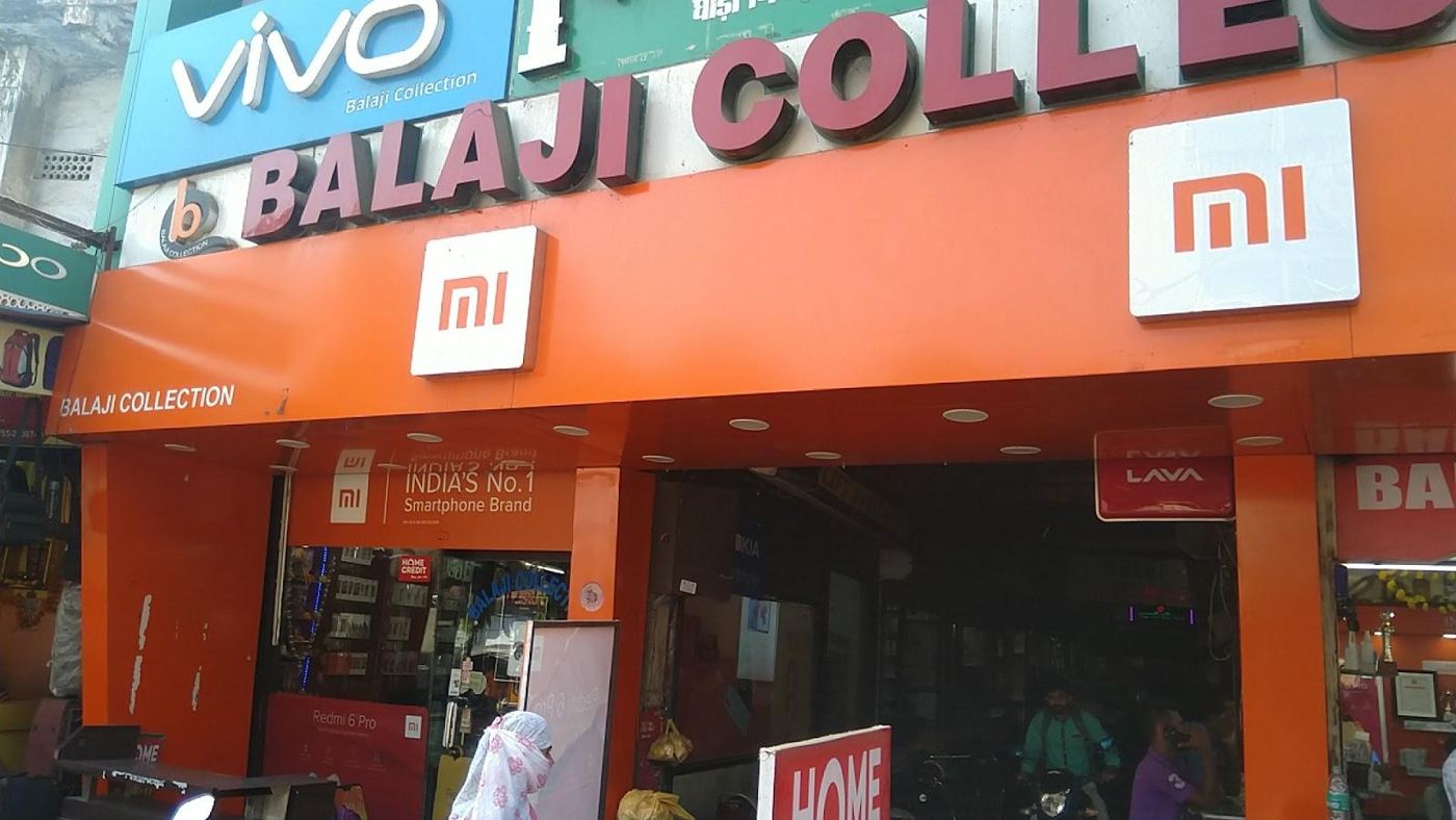 Balaji Collection shopfront with orange Mi branding and vivo sign